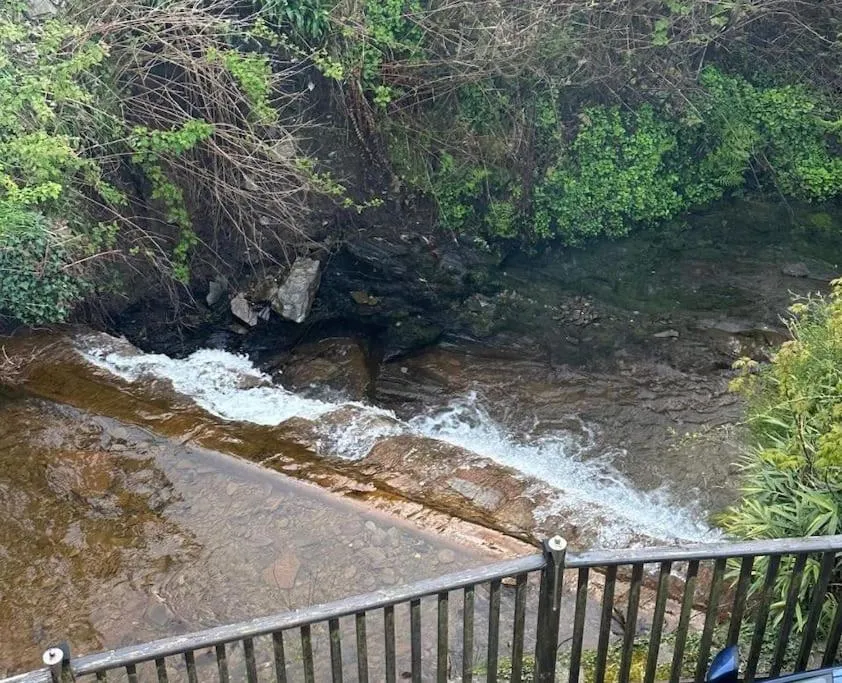 The hot tub by the waterfall - facilities included